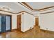 Entryway features hardwood floors and a decorative front door at 2705 Luke Edwards Rd, Dacula, GA 30019