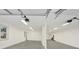 Spacious, unfinished garage with concrete floors and ample natural light at 2705 Luke Edwards Rd, Dacula, GA 30019