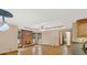 Bright living room with fireplace, hardwood floors, and large windows at 2705 Luke Edwards Rd, Dacula, GA 30019