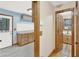 Mud room with painted cabinets and a small laundry area at 2705 Luke Edwards Rd, Dacula, GA 30019