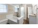 Bright bathroom featuring a shower, a bathtub, and a granite-top vanity at 2800 Kingston Ter, Atlanta, GA 30344