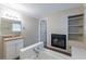 Bathroom boasts a soaking tub, granite vanity, and a charming fireplace feature at 2800 Kingston Ter, Atlanta, GA 30344