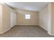 Neutral bedroom features carpet and double closet with ample space and natural light at 2800 Kingston Ter, Atlanta, GA 30344