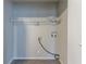 Minimalist laundry room hookups offer a blank canvas for customization at 2800 Kingston Ter, Atlanta, GA 30344