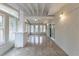 Bright sunroom with brick accents, tiled floors, and multiple windows offering natural light at 2800 Kingston Ter, Atlanta, GA 30344