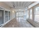 Tiled sunroom featuring multiple windows and glass doors, enhancing natural light and views at 2800 Kingston Ter, Atlanta, GA 30344