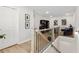 Upstairs loft area with railing, showcasing a cozy seating area and stylish decor at 2980 Ferrington Way, Smyrna, GA 30080