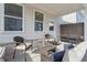 Cozy covered patio area with comfortable seating, perfect for relaxing outdoors at 2980 Ferrington Way, Smyrna, GA 30080