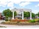 Entrance to Smyrna Market Village, featuring decorative landscaping at 2980 Ferrington Way, Smyrna, GA 30080