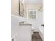 Traditional bathroom with updated vanity, granite countertops, and tile accents at 2328 Starline Dr, Decatur, GA 30032