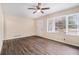 Bright living room with hardwood floors, a ceiling fan, and ample natural light at 2328 Starline Dr, Decatur, GA 30032