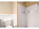 Bathroom featuring a toilet and a shower with white tiles at 3535 Roswell Ne Rd # H2, Atlanta, GA 30305