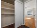Bedroom view featuring a closet with sliding doors and wood floors at 3535 Roswell Ne Rd # H2, Atlanta, GA 30305
