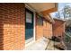 Front porch featuring a railing and a blue entry door at 3535 Roswell Ne Rd # H2, Atlanta, GA 30305