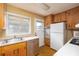 Functional kitchen featuring ample cabinetry, standard appliances, and a convenient layout at 3535 Roswell Ne Rd # H2, Atlanta, GA 30305