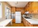 Functional kitchen featuring ample cabinetry, standard appliances, and a convenient layout at 3535 Roswell Ne Rd # H2, Atlanta, GA 30305