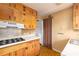 Functional kitchen featuring ample cabinetry, standard appliances, and a convenient layout at 3535 Roswell Ne Rd # H2, Atlanta, GA 30305