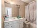 Bathroom featuring a shower/tub combo, a white toilet, and a single-sink vanity with storage at 461 Wynns Way, Atlanta, GA 30331