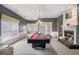 Bonus room with a billiard table, fireplace, neutral walls, and abundant natural light from the windows at 461 Wynns Way, Atlanta, GA 30331