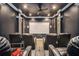 Home theater featuring tiered seating, a ceiling fan, recessed lighting, and a projector screen at 461 Wynns Way, Atlanta, GA 30331