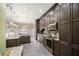 Chef's kitchen featuring an island, stainless appliances, and tiled flooring at 461 Wynns Way, Atlanta, GA 30331