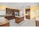 Modern kitchen with stainless steel appliances, granite countertops, and a center island cooktop at 461 Wynns Way, Atlanta, GA 30331