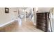 Spacious, open-concept living area with hardwood floors and staircase leading to the second floor at 461 Wynns Way, Atlanta, GA 30331
