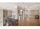 Open loft area with hardwood floors, decorative columns, and versatile space at 461 Wynns Way, Atlanta, GA 30331