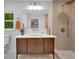 Modern bathroom with stylish vanity, updated fixtures, and a walk-in shower at 615 Spruce Dr, Pine Lake, GA 30072