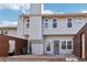 The backyard features a brick patio area and fenced-in yard, perfect for outdoor entertaining at 1908 Variations Ne Dr, Atlanta, GA 30329