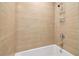Modern bathroom showcasing new neutral tile work and a shower-tub combo at 1908 Variations Ne Dr, Atlanta, GA 30329