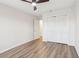 Bedroom with wood laminate floors, a ceiling fan, a closet and an ensuite bathroom at 1908 Variations Ne Dr, Atlanta, GA 30329