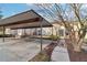 Covered parking and concrete driveway provides ample parking at the front of the home at 1908 Variations Ne Dr, Atlanta, GA 30329
