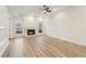 Bright living room with fireplace, ceiling fan, and hardwood floors at 1908 Variations Ne Dr, Atlanta, GA 30329