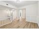 Bright living room featuring hardwood floors and modern white trim, creating a clean and inviting atmosphere at 1908 Variations Ne Dr, Atlanta, GA 30329