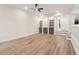 Spacious living room with built-in shelving, hardwood floors, and neutral decor at 1908 Variations Ne Dr, Atlanta, GA 30329