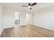 Bright, spacious main bedroom showcasing wood laminate floors and an ensuite bathroom at 1908 Variations Ne Dr, Atlanta, GA 30329