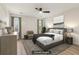 Relaxing main bedroom with ceiling fan, natural light, area rug, and neutral decor at 1908 Variations Ne Dr, Atlanta, GA 30329