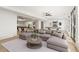Finished basement with billiards table, wet bar, and large sectional seating area at 5060 Lake Forrest Dr, Atlanta, GA 30342
