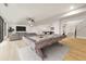 Finished basement featuring a billiards table, gray sectional sofa, and wood-look floors at 5060 Lake Forrest Dr, Atlanta, GA 30342