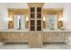 Elegant bathroom vanity with double sinks, marble countertop, and custom cabinetry at 5060 Lake Forrest Dr, Atlanta, GA 30342