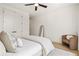 Bright bedroom with hardwood floors, ceiling fan, and closet at 5060 Lake Forrest Dr, Atlanta, GA 30342