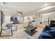 Spacious living room with modern furnishings and an open layout, perfect for entertaining at 5060 Lake Forrest Dr, Atlanta, GA 30342
