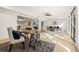 Open-concept living space with a workstation, open living room, and bar, ideal for modern living at 5060 Lake Forrest Dr, Atlanta, GA 30342