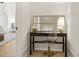 Cozy office nook features a desk, chair, and decorative mirror at 5060 Lake Forrest Dr, Atlanta, GA 30342