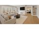 Finished basement with walkout to deck, living room, bookshelves, and gym at 2353 Habersham Sw Dr, Marietta, GA 30064