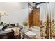 Bathroom features elegant vanity, a tub with shower, and stylish shower curtain at 2353 Habersham Sw Dr, Marietta, GA 30064