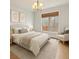 Bedroom with neutral decor and view of the deck at 2353 Habersham Sw Dr, Marietta, GA 30064