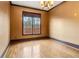 Neutral bedroom with hardwood floors, natural light, and brown trim at 2353 Habersham Sw Dr, Marietta, GA 30064