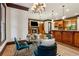 Inviting dining area with elegant chandelier, fireplace, and adjacent access to the gourmet kitchen at 2353 Habersham Sw Dr, Marietta, GA 30064